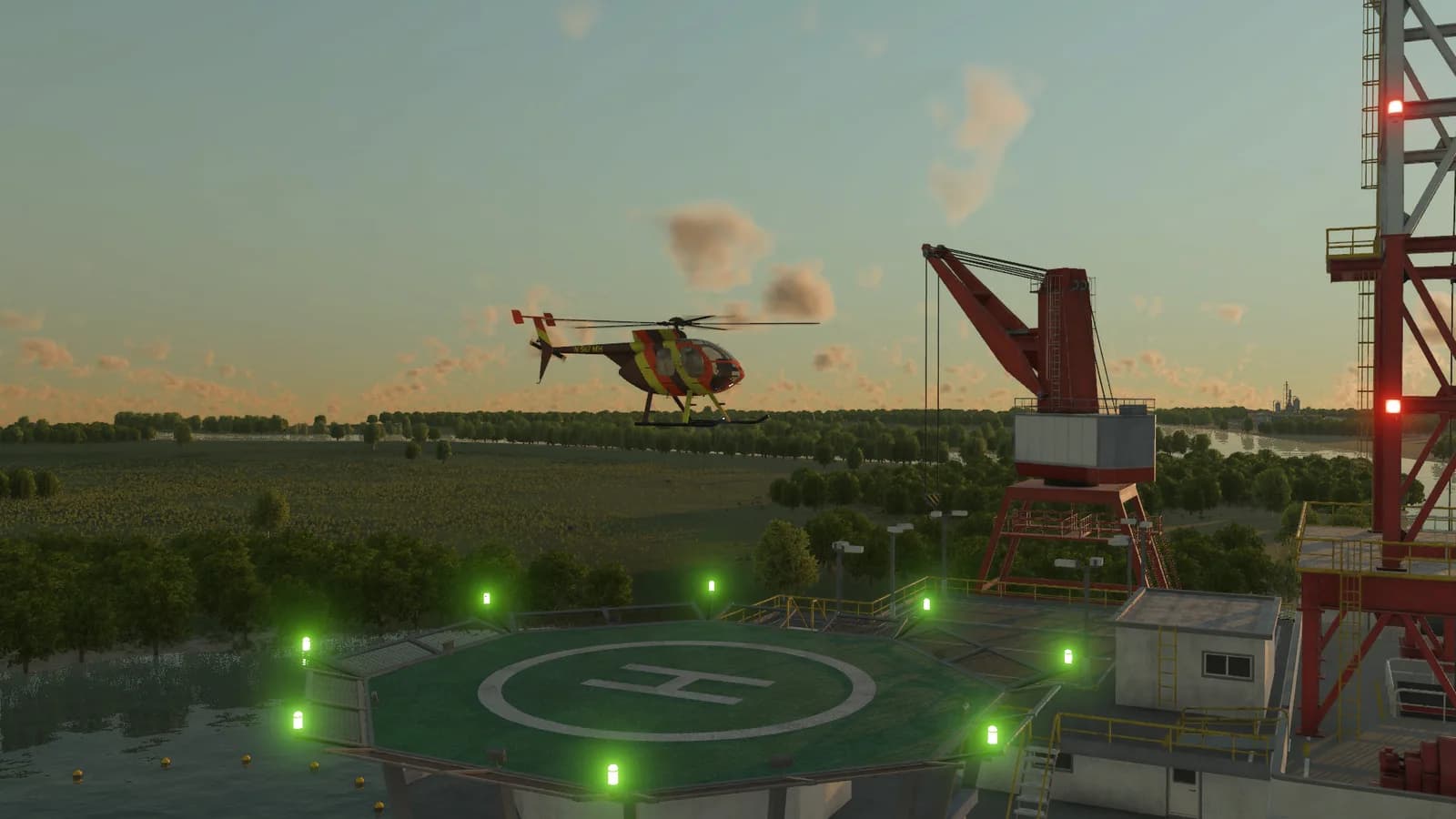 Helicopter landing on an offshore helipad at dusk