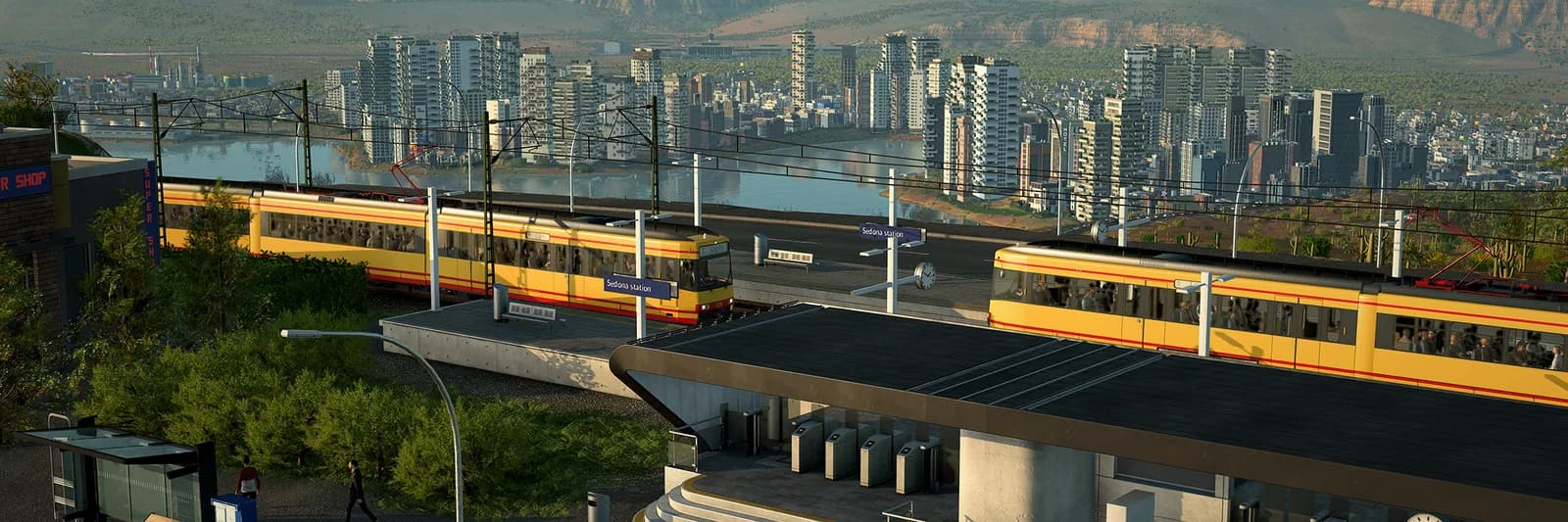 Yellow commuter trains approaching city terminal