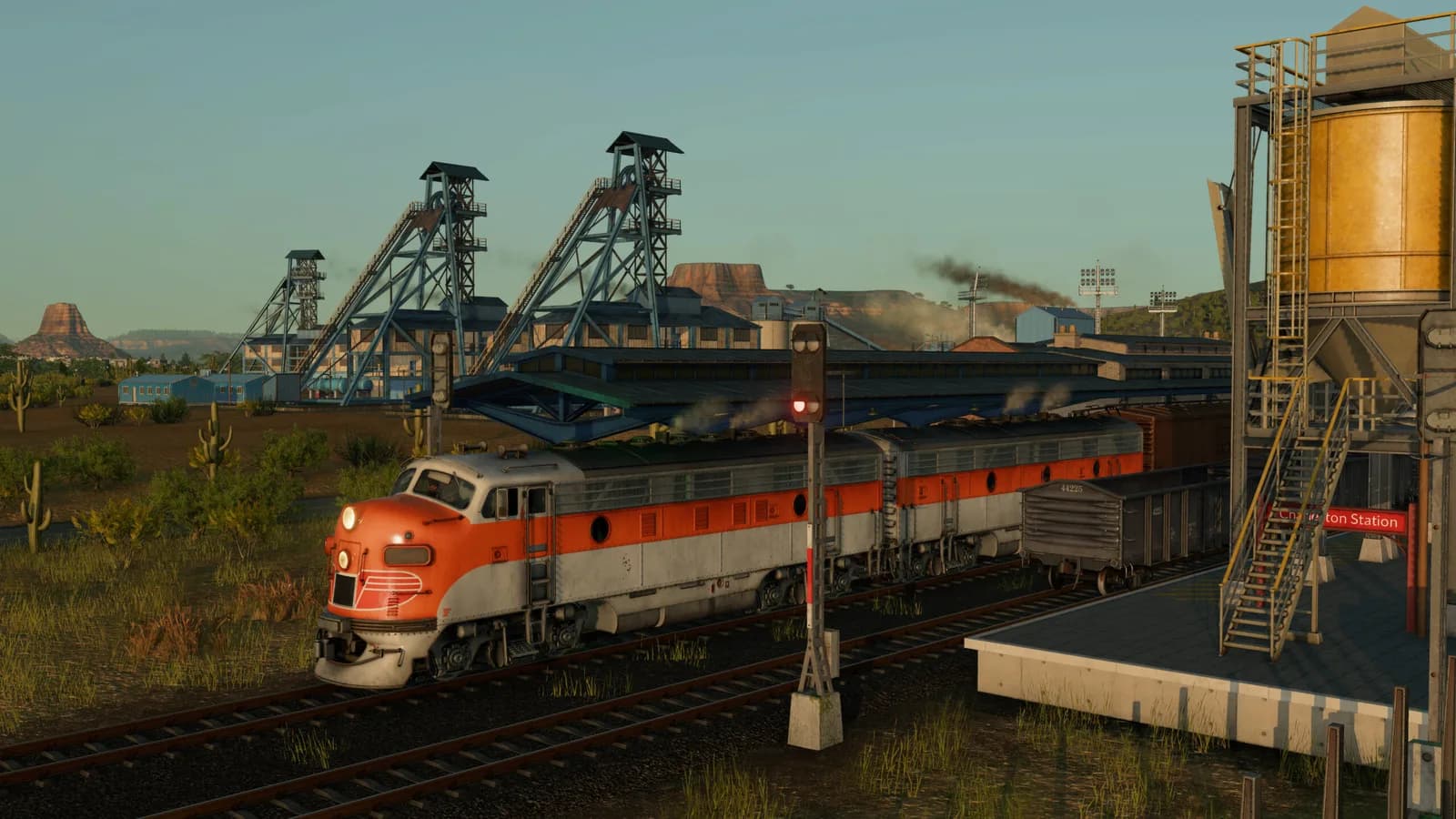 Orange locomotive in a coastal freight port