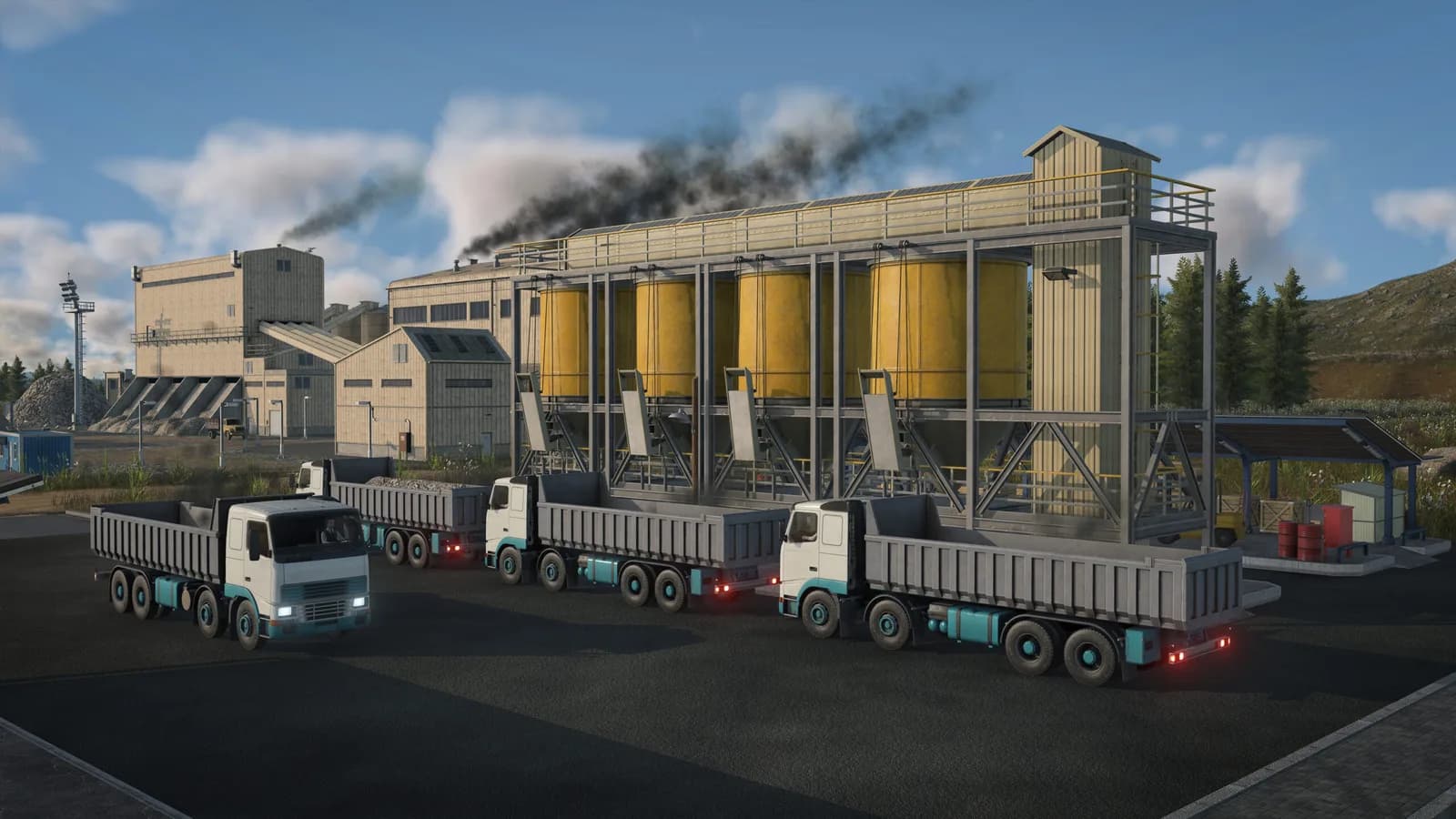 Trucks loading at industrial silos