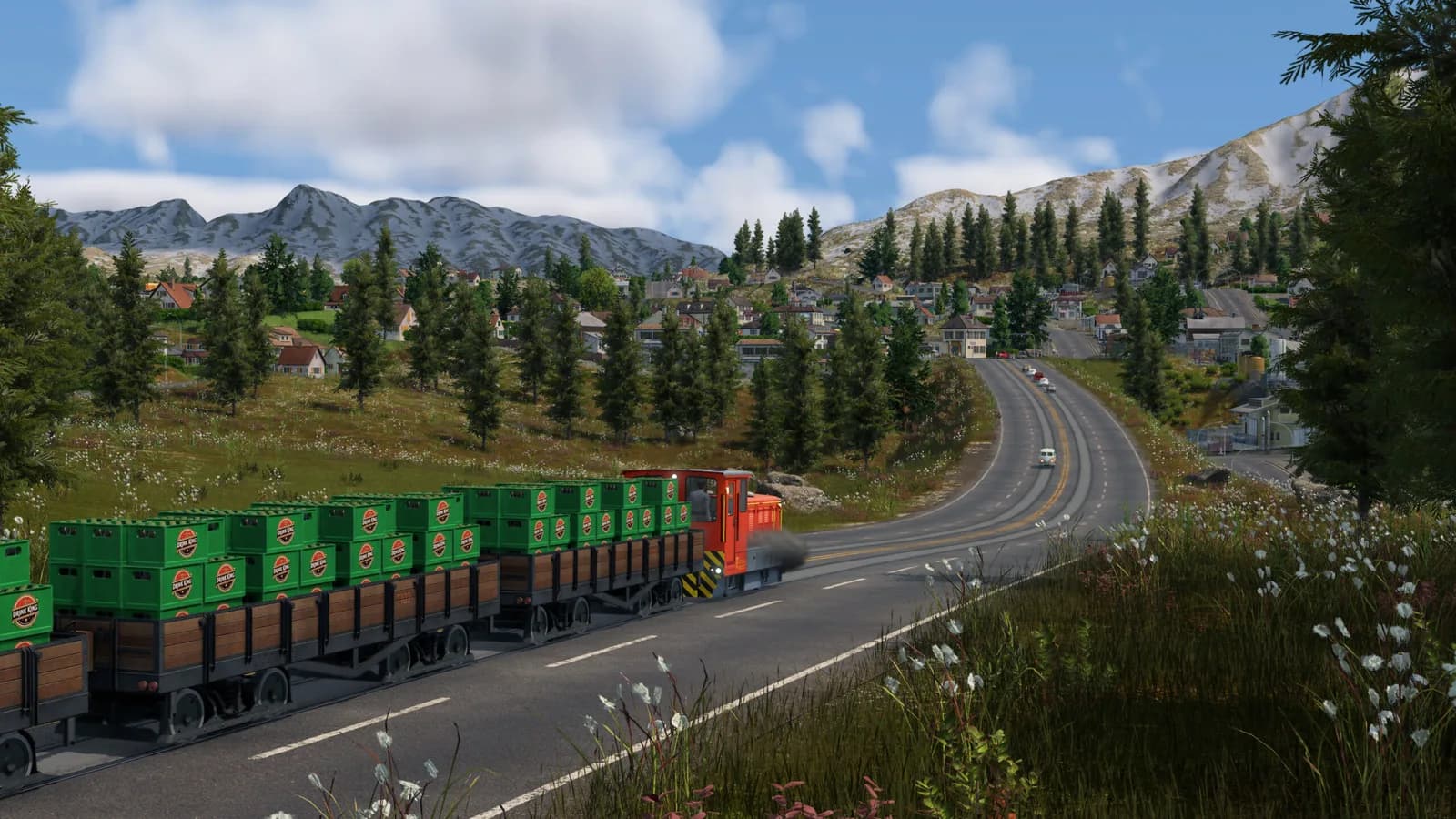 Freight train curving through mountain countryside
