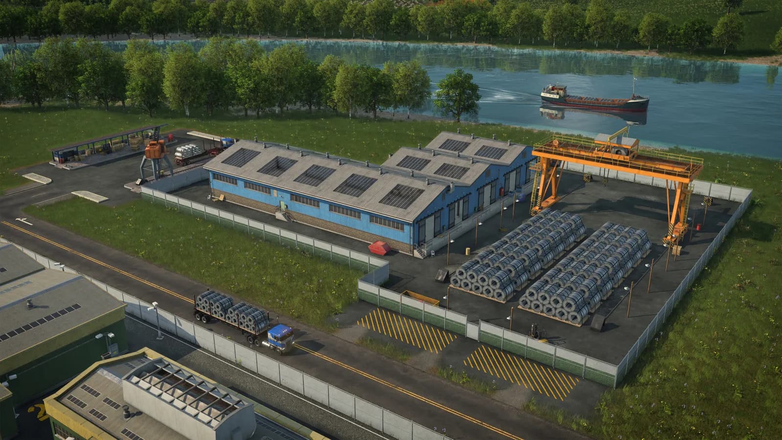 Industrial cargo facility beside a river